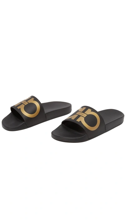 Shop Ferragamo Groove Slide In Black/gold