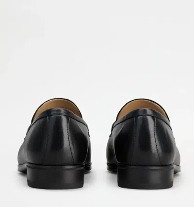 Tod's Logo-debossed Leather Penny Loafers In Black