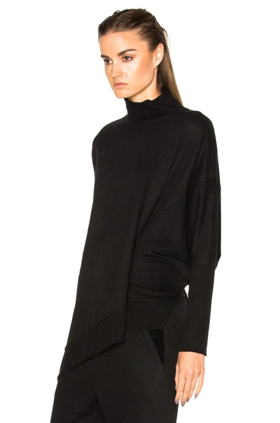Shop Ann Demeulemeester Turtleneck Asymmetric Sweater In Black