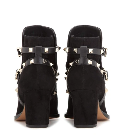 Shop Valentino Garavani Rockstud Suede Ankle Boots In Black