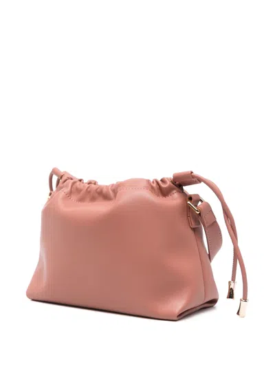 Apc Ninon Mini Pink Crossbody Bag With Embossed Logo On The Front And Adjustable Shoulder Strap In Ecole