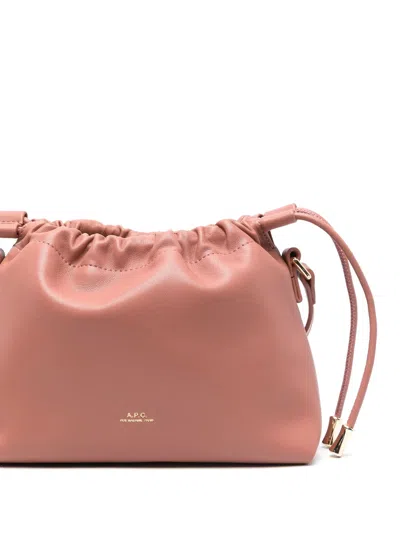 Apc Ninon Mini Pink Crossbody Bag With Embossed Logo On The Front And Adjustable Shoulder Strap In Ecole