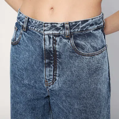 Alaïa Twisted Stonewashed Denim Jeans In Blue