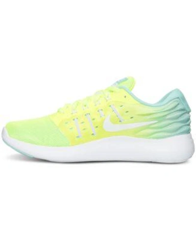 Shop Nike Women's Lunarstelos Running Sneakers From Finish Line In Volt/white-hyper Turq-cle
