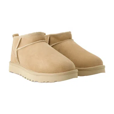 Shop Ugg W Classic Ultra Mini Boots In Beige