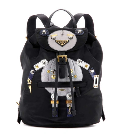 Prada Robot Large Appliquéd Shell And Leather Backpack In Black