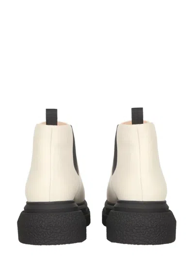 Shop Stuart Weitzman Charli Boots In Beige