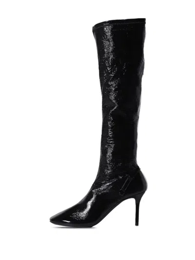 Shop Courrèges Boots In Black