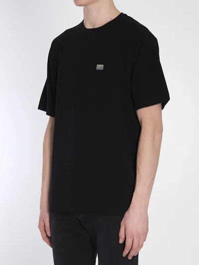 Dolce & Gabbana Cotton T-shirt With Metal Plaque Featuring Front Logo In Black