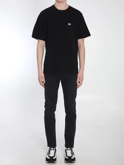 Dolce & Gabbana Cotton T-shirt With Metal Plaque Featuring Front Logo In Black