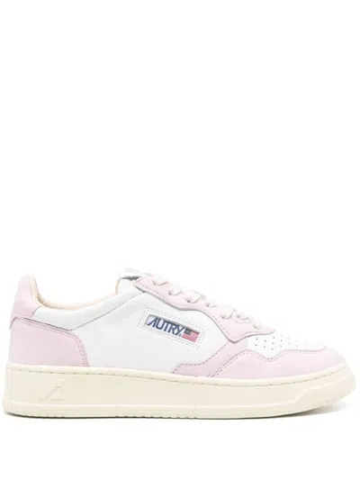 Shop Autry Sneakers In White
