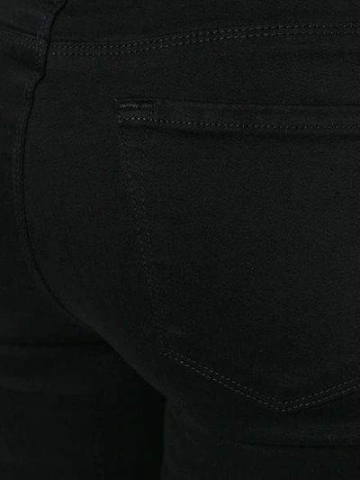 Shop J Brand Flared Cropped Jeans In J3103 Black Bastille