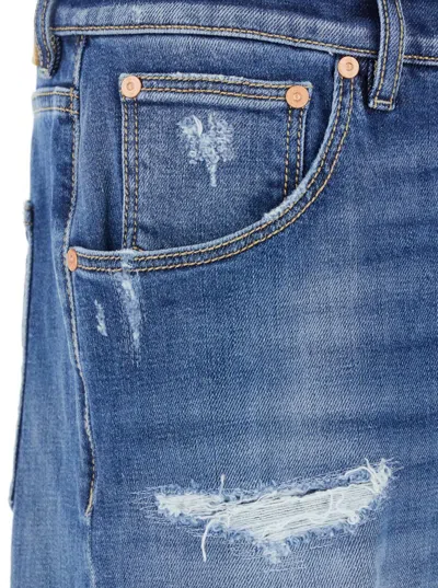 Pt Torino Blue Five Pocket Jeans With Rips And Logo Patch On The Back In Denim Man In Blue
