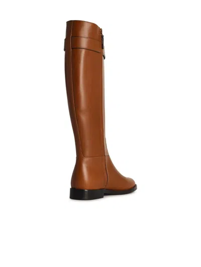 Tory Burch T Lock Riding Boot In Brown