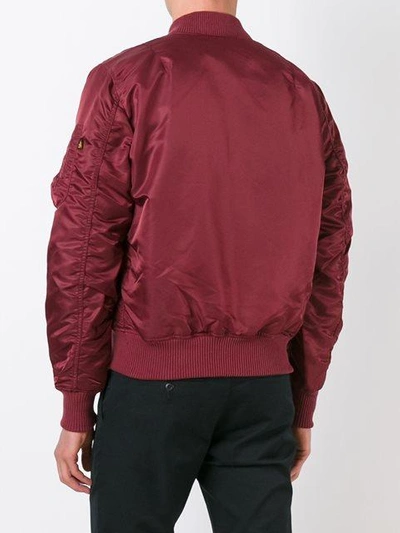 Shop Alpha Industries Bomberjacke Mit Detail Am Ärmel In Red