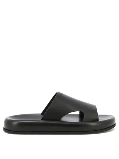 Ferragamo Logo-embossed Leather Slides In Black