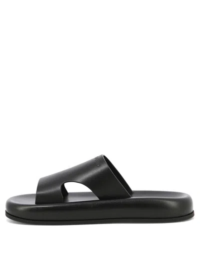 Ferragamo Logo-embossed Leather Slides In Black