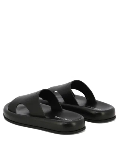 Ferragamo Logo-embossed Leather Slides In Black