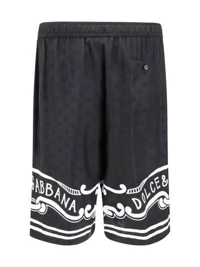 Dolce & Gabbana Black Bermuda Pants With Drawstring Elastic Waist And Maxi Print In Silk Man In Black