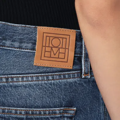 Totême Toteme Twisted Seam Slim Jeans In Blue