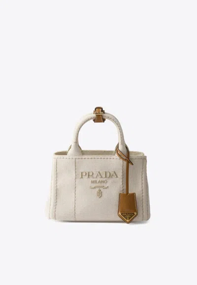 Prada Womens Black Triangle-plaque Embroidered-jacquard Medium Woven Tote Bag In Beige