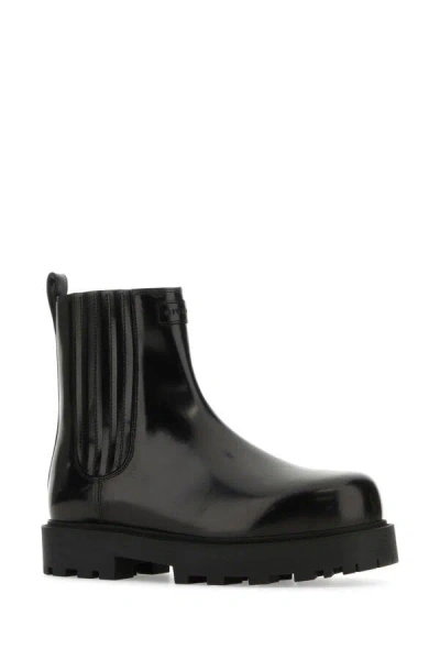Givenchy Streamlined Leather Ankle Boots In Black