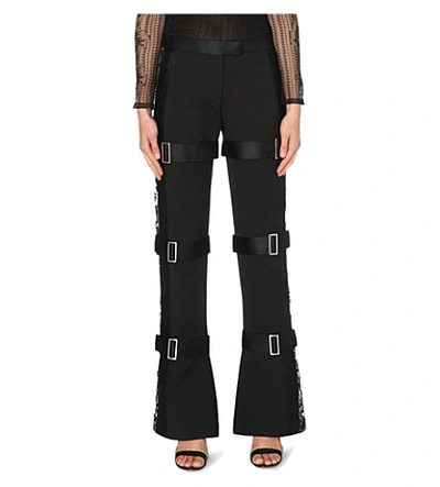 Shop Alexander Mcqueen Flared Wool And Silk-blend Trousers In Black