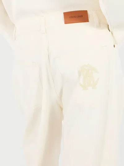 Roberto Cavalli Python-print Trousers In Neutrals