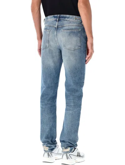 Givenchy Washed Denim Tapered Leg Jeans With Contrast Stitching In Ocean Blue
