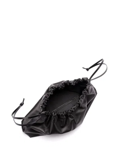 Jil Sander 'curve Medium' Black Shoulder Bag With Embossed Logo On The Front And Curved Design In Black