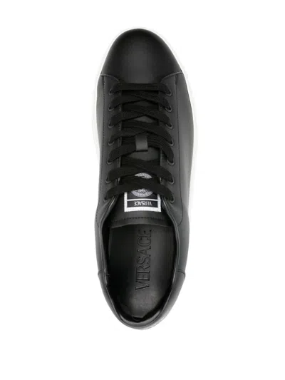 Versace Leather Sneakers With La Greca Detail In Black