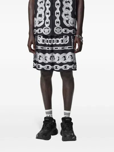 Versace Knee-length Activewear Shorts With Bold Chain Graphic In Black