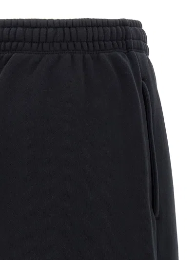 Maison Kitsuné 'fox Cub' Elastic Waistband Joggers With Side Pockets In Black