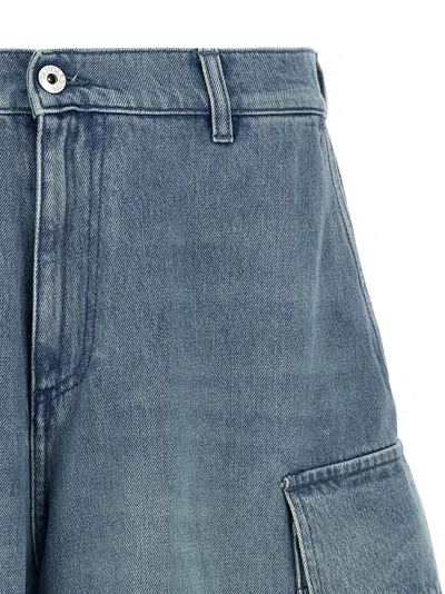 Jw Anderson Light Blue Bermuda Shorts With Cargo Pockets And Logo Patch On The Back In Denim Man In Light Blue