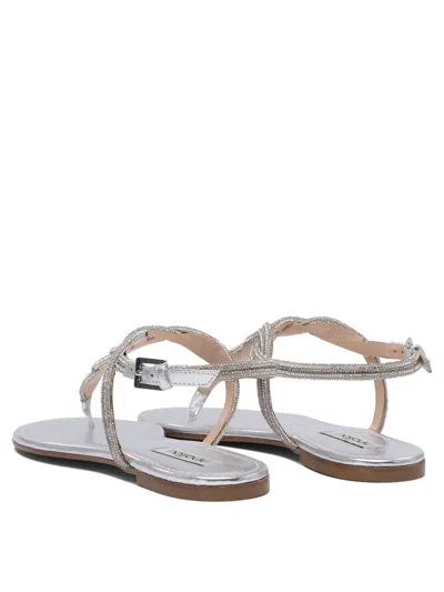 Ninalilou Braided Leather Sandals With Silver Finish In Silver