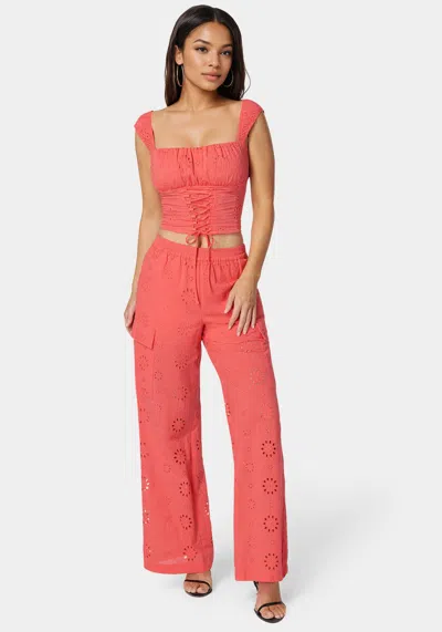Bebe Eyelet Lace Up Corset In Calypso Coral
