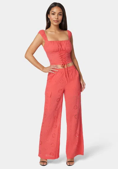 Bebe Eyelet Lace Up Corset In Calypso Coral
