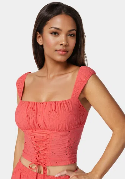 Bebe Eyelet Lace Up Corset In Calypso Coral