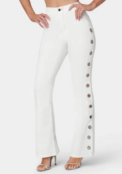 Bebe White High Waist Flared Grommet Jeans In Soft White Wash