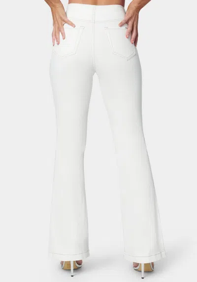 Bebe White High Waist Flared Grommet Jeans In Soft White Wash