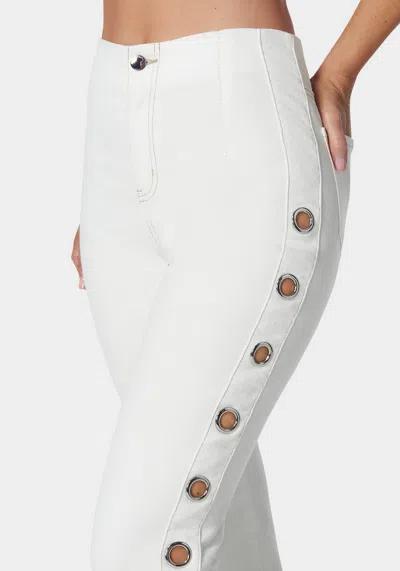 Bebe White High Waist Flared Grommet Jeans In Soft White Wash