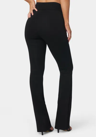 Bebe Twisted Waist Flared Leg Pant In Black