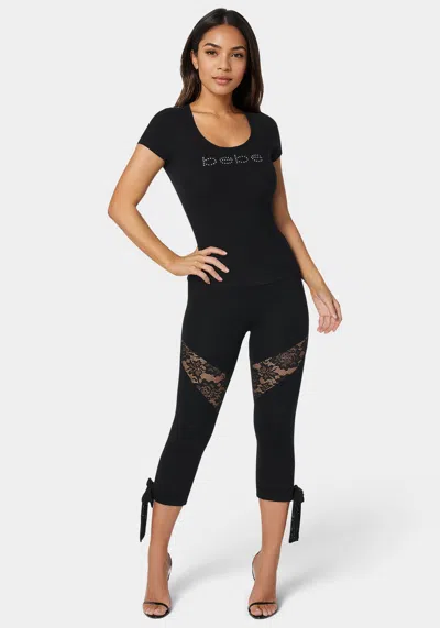 Bebe Lace Insert Bow Capri Legging In Black