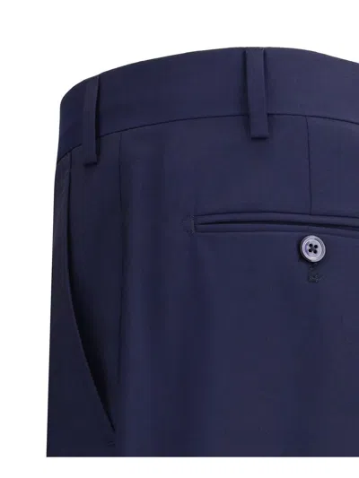Gi Capri Virgin Wool Tapered-leg Trousers In Blue