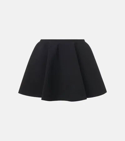 Alaïa Ribbed Flared Mid-rise Wool-blend Mini Skirt In Black
