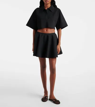 Alaïa Ribbed Flared Mid-rise Wool-blend Mini Skirt In Black