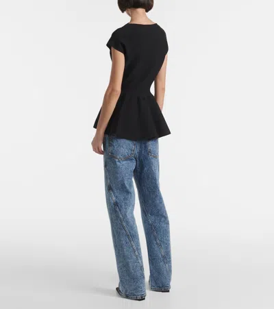 Alaïa Knitted Skater Dress In Black