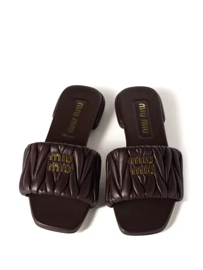 Miu Miu Matelassé Nappa Leather Slides In Brown