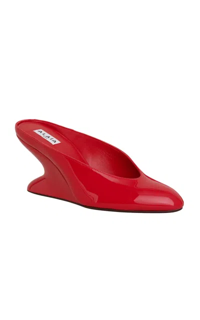 Alaïa Patent-leather Wedge Mules In Red