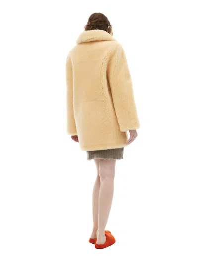 Ami Alexandre Mattiussi Fur Coat With Hook Closure In Yellow